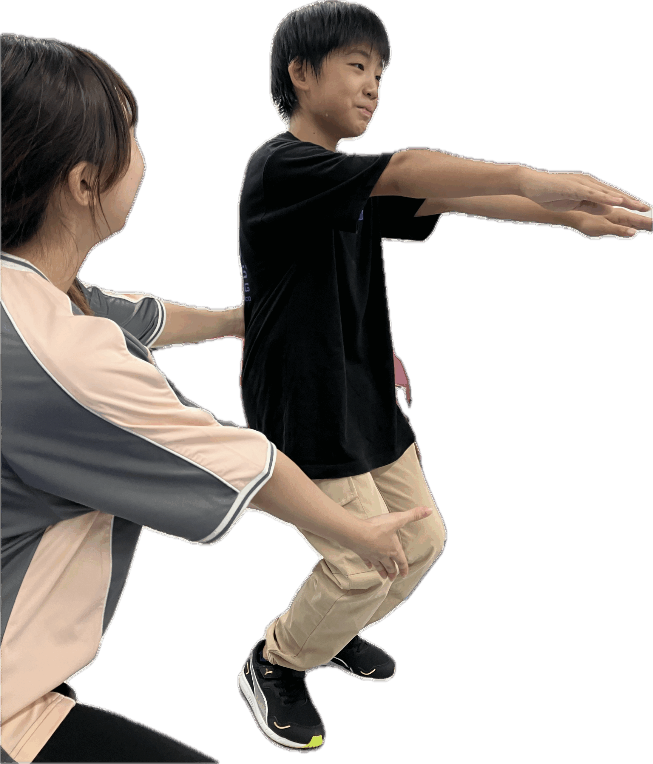 コーチによる補助の様子：基礎体力向上